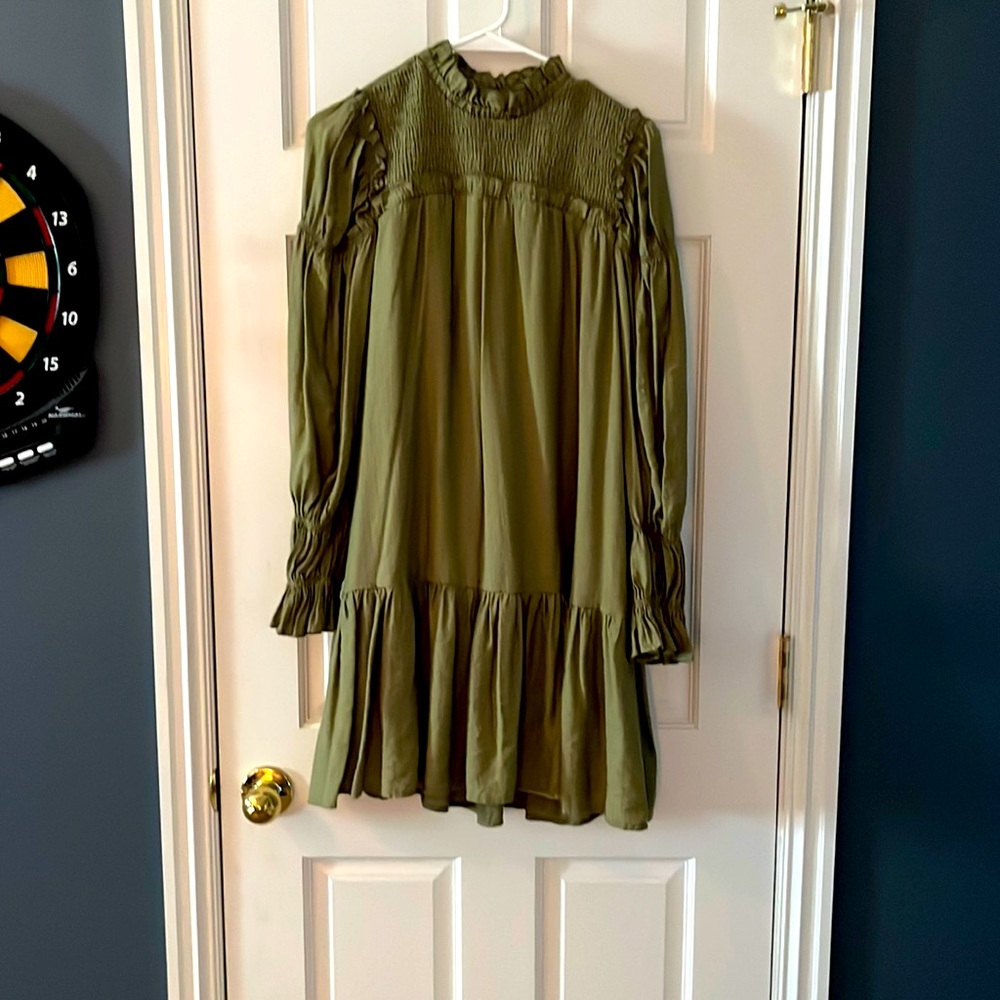 Long sleeve dress with light slip liner underneath.